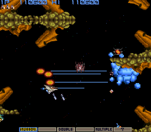 Gradius Arcade Screenshot: The Moai can be destroyed, but it takes a lot of firepower...