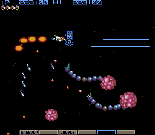 Gradius Arcade Screenshot: Some alien hands reach out and try to destroy the player!