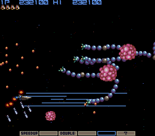 Gradius Arcade Screenshot: Dodge all of the bullets, you can't destroy those...