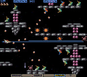 Gradius for Arcade - Blast through the purple blocks to create a path...
