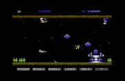 Gradius for Commodore 64 - Shoot the structure on the ground to stop enemies from appearing.