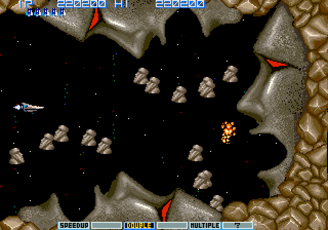 Vulcan Venture Arcade Screenshot: The Moai end of level boss.