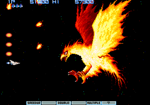 Vulcan Venture Arcade Screenshot: Dodging fire from the Phoenix, the first end of level boss.