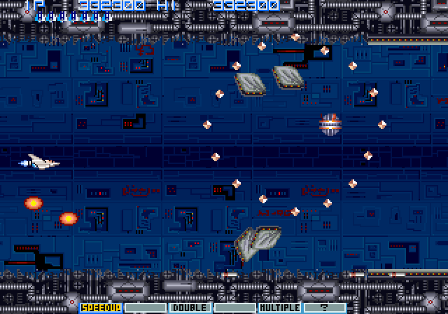 Vulcan Venture Arcade Screenshot: Large tiles rapidly head your way! You need to shoot quick or be ready to dodge them...
