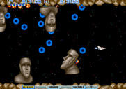 Vulcan Venture for Arcade - A Moai mini-battle precedes the end of level boss...