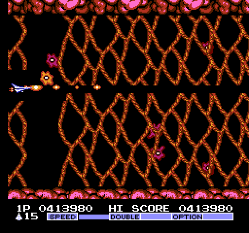 Vulcan Venture NES / Famicom Screenshot: Shoot a path through the wall while dodging more of the amoebas!