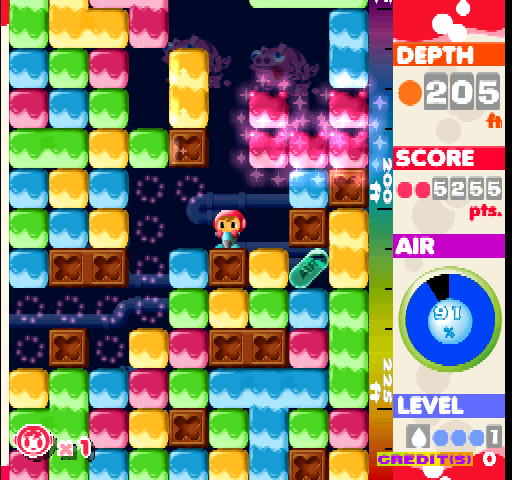 Mr. Driller Arcade Screenshot: These brown blocks are tough to drill through and cost some air if you do...