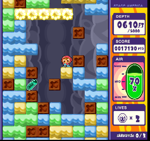 Mr. Driller 2 Arcade Screenshot: Don't get crushed when blocks fall...