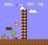 Super Mario Bros. for NES / Famicom - Use the spring to leap over this high wall.