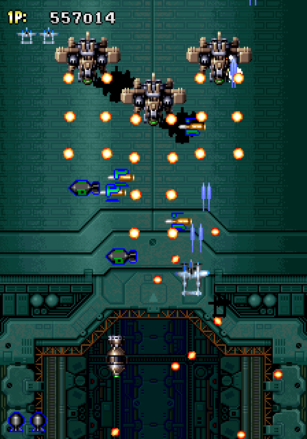 Strikers 1945 Arcade Screenshot: Some fancy maneuvering is needed to avoid being hit here...