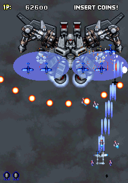 Strikers 1945 Arcade Screenshot: The end of level boss transforms into a giant robot!