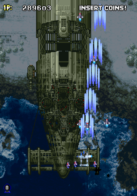 Strikers 1945 Arcade Screenshot: Some end of level bosses, such as this one, have multiple stages that all need to be destroyed.