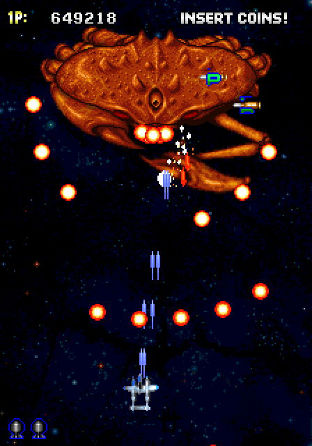 Strikers 1945 Arcade Screenshot: The later, more challenging bosses can take on multiple forms.