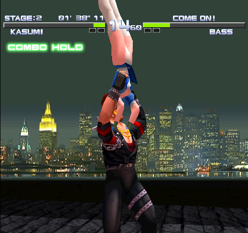 Dead or Alive++ Arcade Screenshot: Attacking from above!