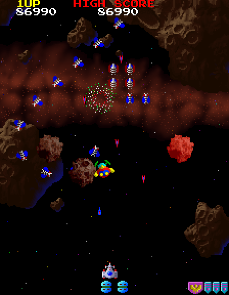 Galaga '88 Arcade Screenshot: Shooting an enemy formation...