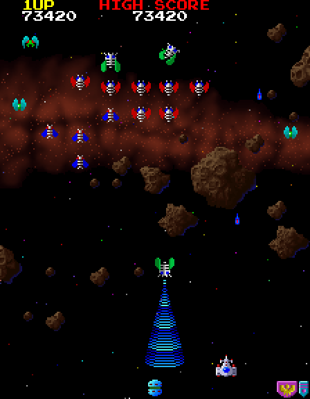 Galaga '88 Arcade Screenshot: Be careful, the game is over if your last fighter gets captured...
