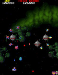Galaga '88 for Arcade - Shoot the silver spheres and they explode...