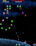 Galaga '88 for Arcade - Aliens circle before an attack...