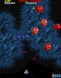 Galaga '88 for Arcade - The screen scrolls vertically in this section of the game...