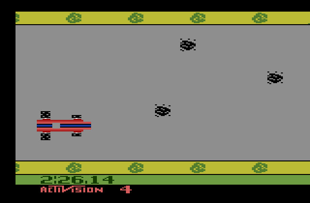 Grand Prix Atari 2600 Screenshot: A bunch of oil slicks in the road...