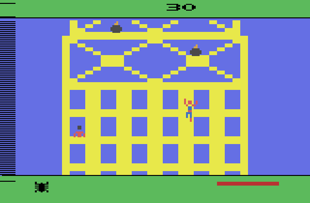 Spider-Man Atari 2600 Screenshot: Watch out for bombs at the top of the building...