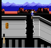 Rollergames for NES / Famicom - Jump over gaps and don't get hit by barrels.