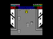 Action Fighter for ZX Spectrum - The yellow sign indicates if a change in the road is up ahead...