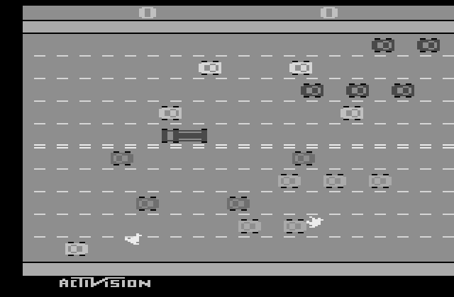 Freeway Atari 2600 Screenshot: Getting hit by cars will slow down your chicken!