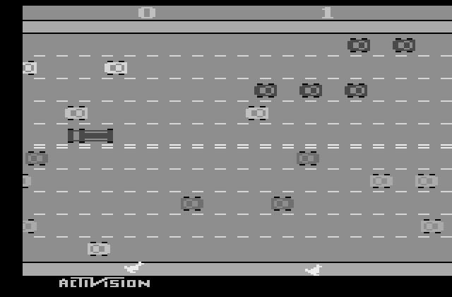 Freeway Atari 2600 Screenshot: The chicken on the right is ahead by a point...