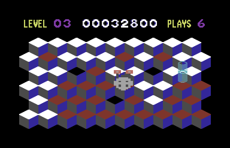 Slinky Commodore 64 Screenshot: The slinky moves quicker than usual when it's blue.