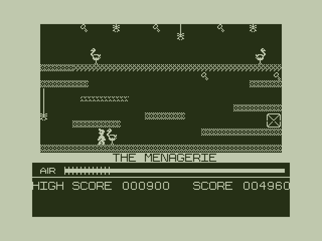 Manic Miner Dragon 32/64 Screenshot: "The Menagerie"...Hurry, run away!