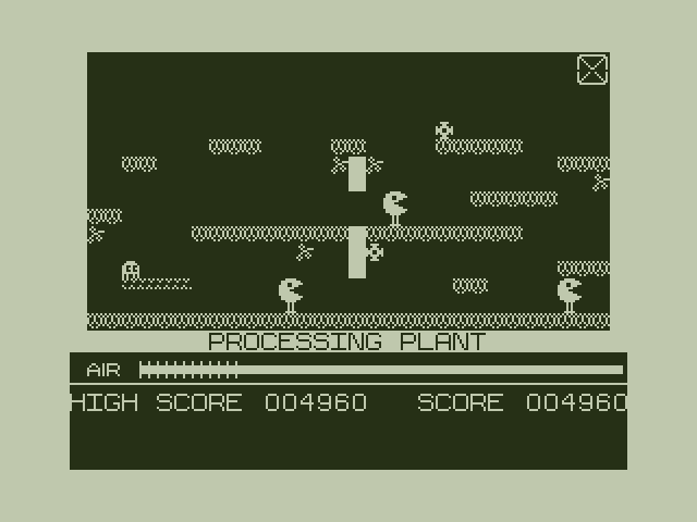 Manic Miner Dragon 32/64 Screenshot: Game demo; the Processing Planet.