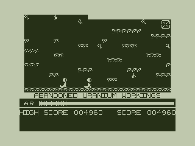 Manic Miner Dragon 32/64 Screenshot: Game demo; the Abandoned Uranium Workings...