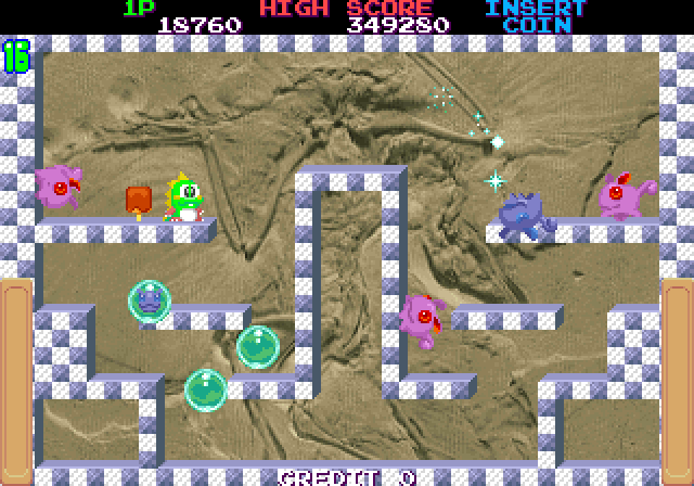 Bubble Memories: The Story of Bubble Bobble III Arcade Screenshot: Once opponents are captured in bubbles, be sure to pop the bubble...