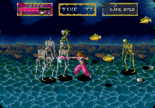 Arabian Magic Arcade Screenshot: Both skeletons and fish attack under water!