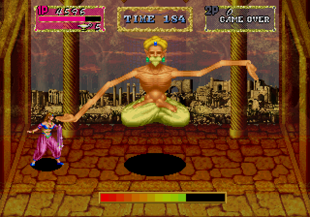Arabian Magic Arcade Screenshot: Don't get hit by this guy's long arms!