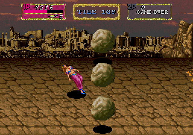 Arabian Magic Arcade Screenshot: Oof, hit by a boulder!