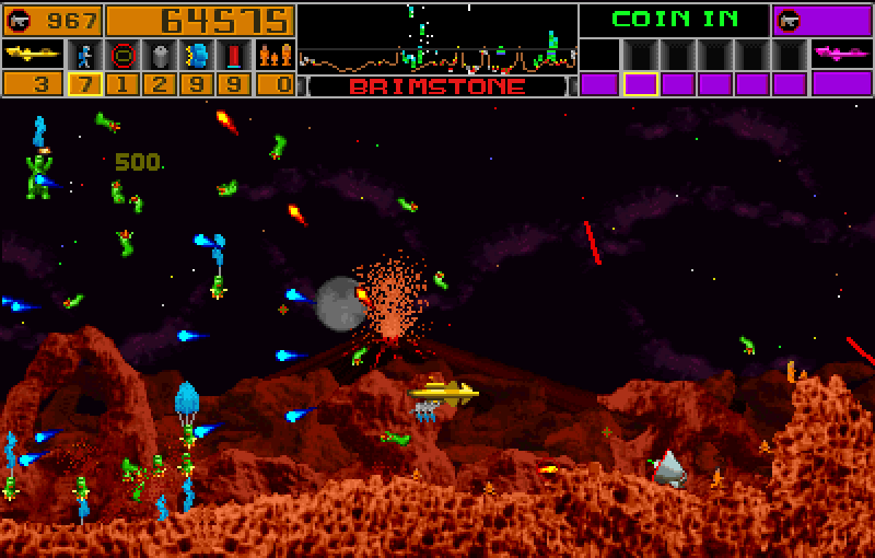Strike Force Arcade Screenshot: This volcanic landscape features a lot of aliens to shoot at...