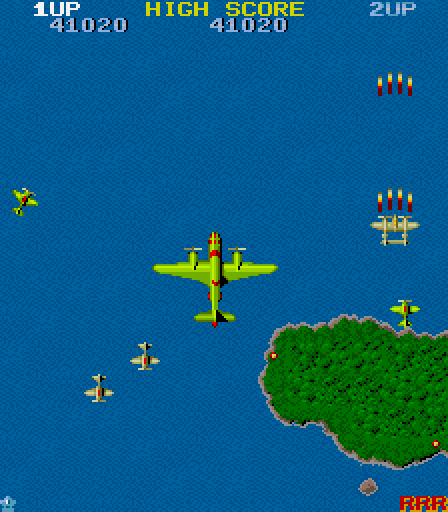 1942 Arcade Screenshot: Those large planes can sneak up from behind! Be careful...