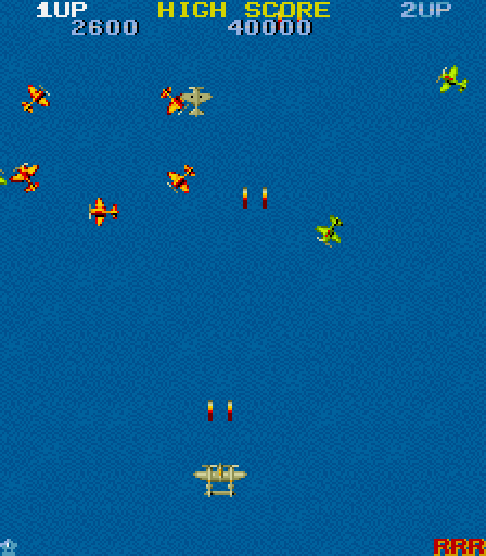 1942 Arcade Screenshot: Shoot the formation of red planes for a bonus item!