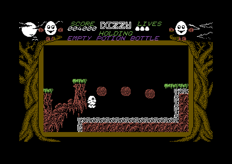 Dizzy: The Ultimate Cartoon Adventure Commodore 64 Screenshot: A failed jump...