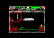 Magicland Dizzy for Amstrad CPC - The shark looks scary, but you can jump on it to cross the water.