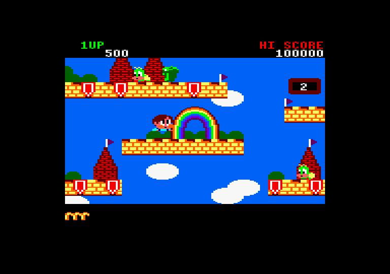 Rainbow Islands Amstrad CPC Screenshot: Use rainbows to help climb or eliminate opponents.