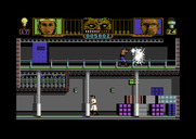 Hammerfist for Commodore 64 - Fighting robots; one destroyed, more to go!
