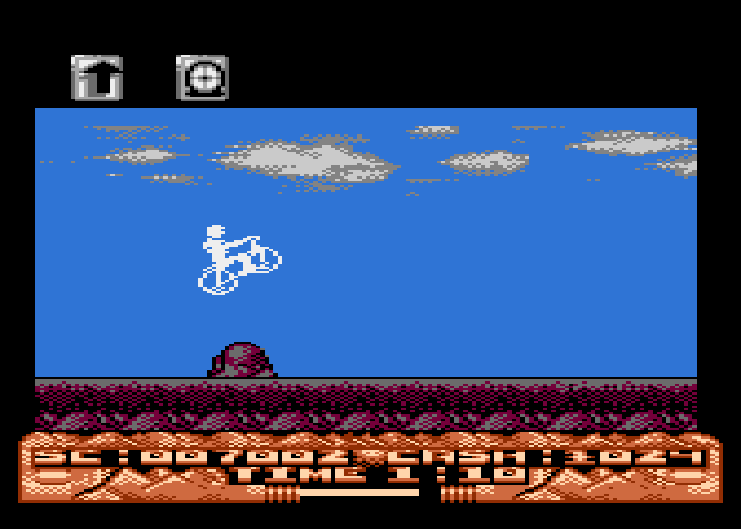 Mountain Bike Racer Atari 8-bit Screenshot: Jump over the rocks.