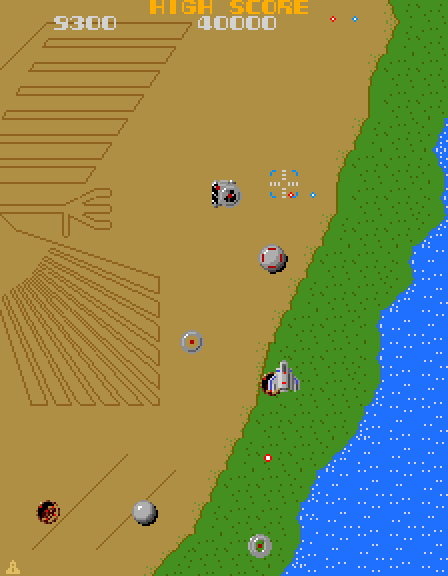 Super Xevious Arcade Screenshot: Ground forces are shooting at me!