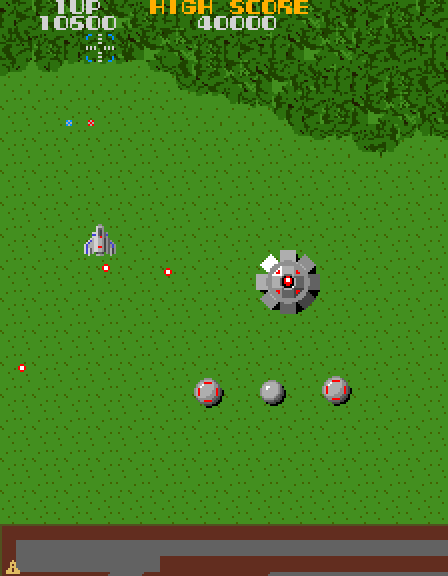 Super Xevious Arcade Screenshot: This thing shoots bullets rapidly, I need to destroy it quickly or dodge quickly.