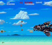 Darius Twin for Super NES - Battle with the first end of level boss.