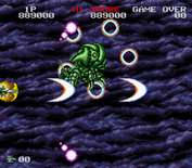 Darius Twin for Super NES - Attacking another mini-boss.