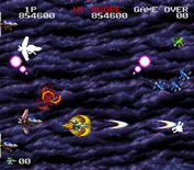 Darius Twin for Super NES - The gold shield is the most powerful one in the game.